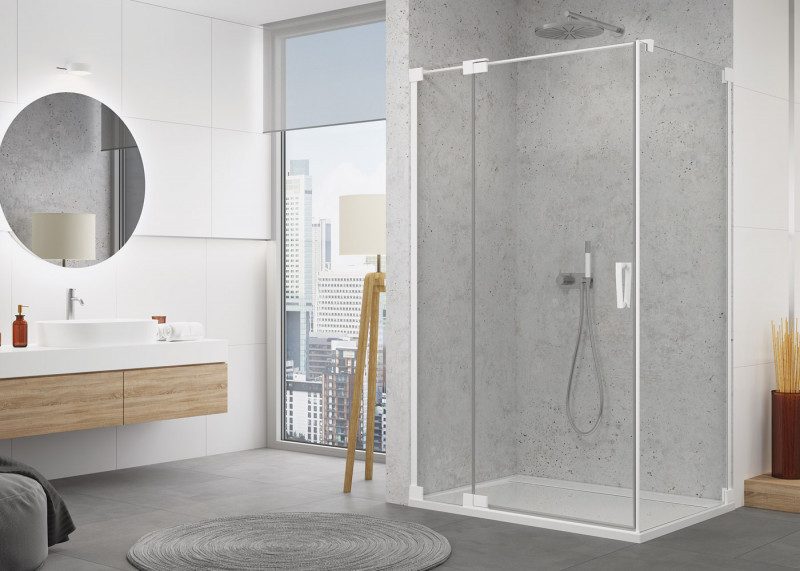 Sanswiss Cadura White Line CA13 drzwi wahadłowe jednoczęściowe z elementem stałym lewe 110 cm do wnęki lub ścianki biały mat przeźroczyste CA13G1100907